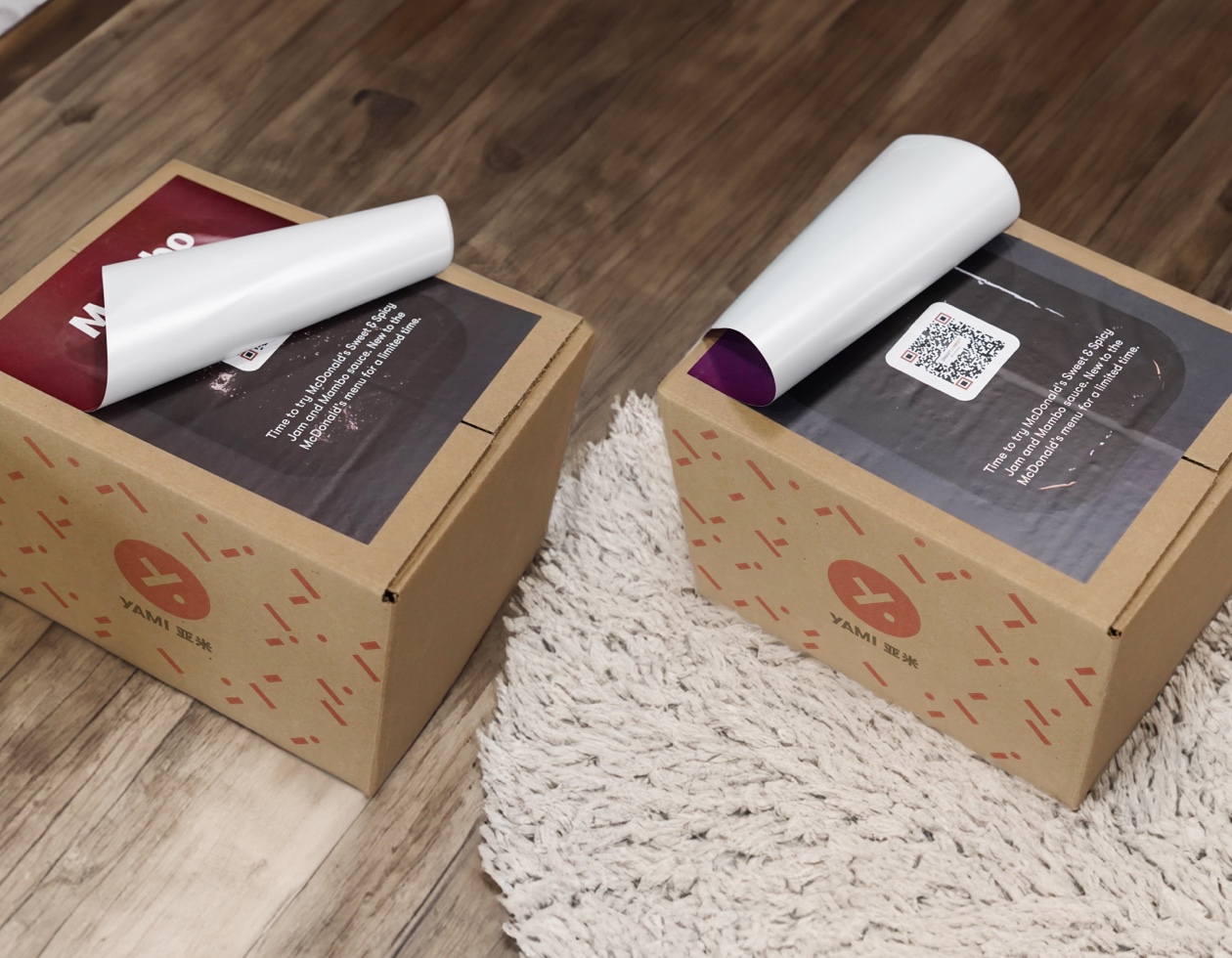 Peelable sauce packaging on a Yami delivery box